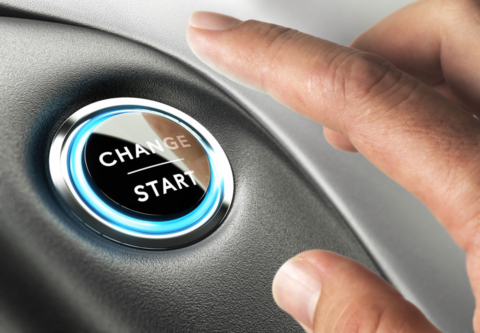 Poză cu un buton de pornire pe care scrie CHANGE / START