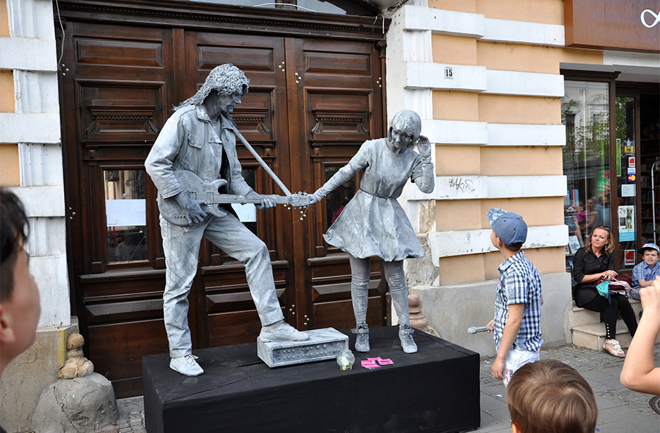 World Champions called Beeldje Living Statues from Netherland doing a busking mime called Sing along, during the Cluj Days of Cluj. On May 24, 2015 in Cluj, Romania
